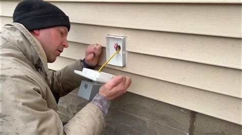 exterior electrical box on sloping soffett|mount electrical box on vinyl siding.